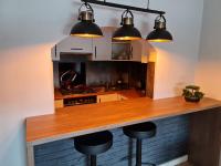 Kuchyňa alebo kuchynka v ubytovaní Apartament Wyszyńskiego Szczecin Polska
