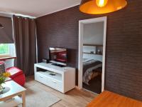 Posteľ alebo postele v izbe v ubytovaní Apartament Wyszyńskiego Szczecin Polska
