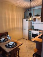 Kuchyňa alebo kuchynka v ubytovaní Przytulny Apartament