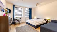 Posteľ alebo postele v izbe v ubytovaní VacationClub - Piłsudskiego 10B Apartament 2