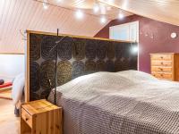 Postel nebo postele na pokoji v ubytování Holiday Home Kanervarinne by Interhome