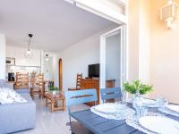Televízia a/alebo spoločenská miestnosť v ubytovaní Apartment Gran Reserva-35 by Interhome