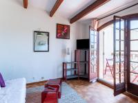 Telewizja i/lub zestaw kina domowego w obiekcie Apartment Les Cyprès by Interhome