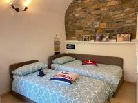 Łóżko lub łóżka w pokoju w obiekcie Apartment by Interhome