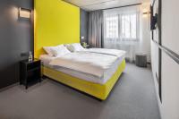 Postel nebo postele na pokoji v ubytování Boutique Hotel Mezi švy