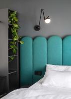 Postel nebo postele na pokoji v ubytování Boutique Hotel Mezi švy