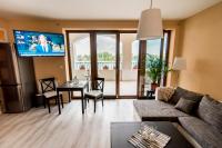Telewizja i/lub zestaw kina domowego w obiekcie Wellness apartmány Fürst