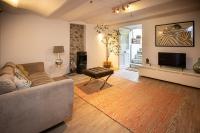 Posedenie v ubytovaní Beautiful converted one bedroom apartment