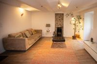 Posedenie v ubytovaní Beautiful converted one bedroom apartment