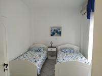 Postel nebo postele na pokoji v ubytování Panorama Apartments