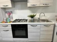 Kuchyňa alebo kuchynka v ubytovaní Bnbook Olona-Fiera Milano