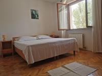 Posteľ alebo postele v izbe v ubytovaní Apartman prvi red do mora Čović