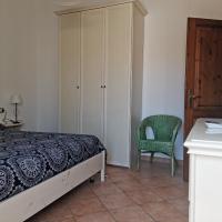 Łóżko lub łóżka w pokoju w obiekcie La casa di Alessia