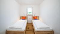 Posteľ alebo postele v izbe v ubytovaní Apartments Presslauer - Mori