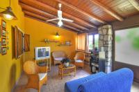 A television and/or entertainment centre at Holiday home with private pool, Solarino