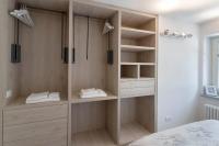 A bed or beds in a room at HelloChalet - Maison Rue de la Neige - Family Ski Holiday walking distance skirun and gondola