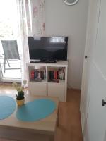 Bungalowにあるテレビまたはエンターテインメントセンター