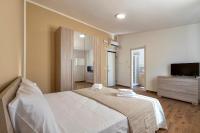 Posteľ alebo postele v izbe v ubytovaní Vico Rooms