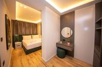 Ένα ή περισσότερα κρεβάτια σε δωμάτιο στο Hotel Lili-1