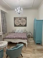 Posteľ alebo postele v izbe v ubytovaní Kalitka Apartman