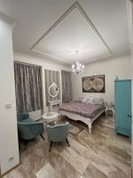 Posteľ alebo postele v izbe v ubytovaní Kalitka Apartman