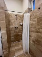 Kúpeľňa v ubytovaní Kalitka Apartman