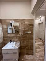 Kúpeľňa v ubytovaní Kalitka Apartman
