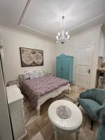 Posteľ alebo postele v izbe v ubytovaní Kalitka Apartman