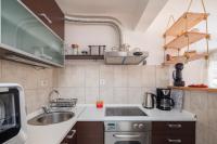 Kuchyňa alebo kuchynka v ubytovaní Apartment Zenta with terrace and sea view, 4 min walk to the beach