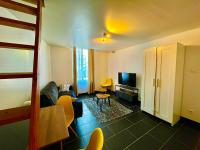 Telewizja i/lub zestaw kina domowego w obiekcie Grand studio avec mezzanine