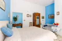 Posteľ alebo postele v izbe v ubytovaní L'Isola Di Ortigia