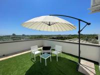 A balcony or terrace at Crival club & more