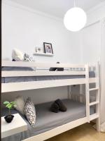 Łóżko lub łóżka w pokoju w obiekcie La Brisa apartamento