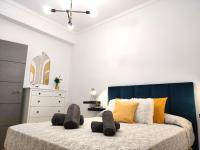 Łóżko lub łóżka w pokoju w obiekcie La Brisa apartamento