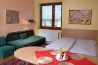 A bed or beds in a room at Chalupa LUKA Terchová