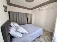 Posteľ alebo postele v izbe v ubytovaní Bel appartement 2 chambres climatisé centre ville