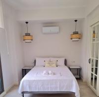 A bed or beds in a room at Ozilvillas