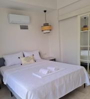 A bed or beds in a room at Ozilvillas