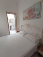 A bed or beds in a room at B&B Lo Scrigno del Salento