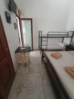 A bed or beds in a room at B&B Lo Scrigno del Salento