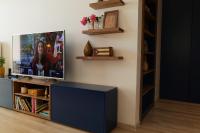 A television and/or entertainment centre at Apartmán - modern home