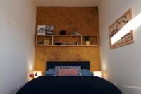 A bed or beds in a room at Apartmán - modern home