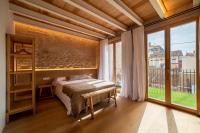 Posteľ alebo postele v izbe v ubytovaní Loft de diseño cerca del mar