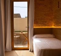 Posteľ alebo postele v izbe v ubytovaní Loft de diseño cerca del mar