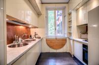 A kitchen or kitchenette at Magia at Colosseum