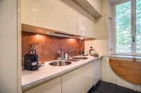 A kitchen or kitchenette at Magia at Colosseum