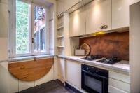 A kitchen or kitchenette at Magia at Colosseum