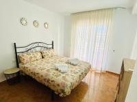 Postel nebo postele na pokoji v ubytování Zafiro Apartments