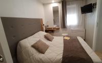 Łóżko lub łóżka w pokoju w obiekcie Mobil home privé prestige " Le Rêve d'été"