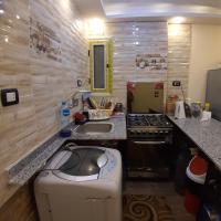 Kuchyň nebo kuchyňský kout v ubytování Panorama Apartment with a charming sea view near Alexandria and Burg ElArab Intl Airport with Free wifi شقة باطلالة ساحرة على البحر اول الساحل الشمالي